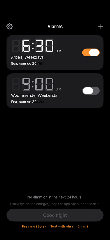 The alarm list in Sunwake: two alarms in retro LED digits, each with label, weekdays, world and sunrise length, and the Good night button.