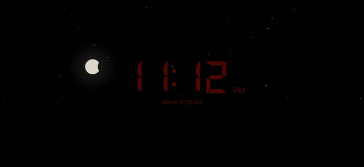 The night screen: a black sky with stars, the moon and the red clock 11:12, with the alarm time below.